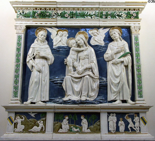Virgin & Child with Saints Francis & Cosmos ceramic (c1470) by Andrea della Robbia of Florence at Bode Museum. Berlin, Germany.