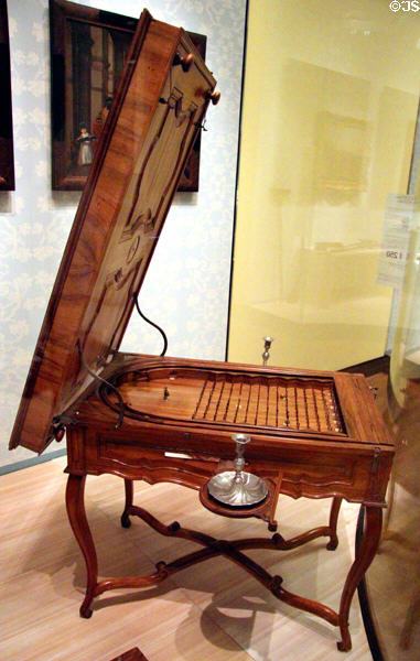 Three games table: billiards on top level; a precursor of modern pinball when lifted open, & an extractable canon game with built in candlesticks (1750-70) from southern Germany or Alsace at German Historical Museum. Berlin, Germany.