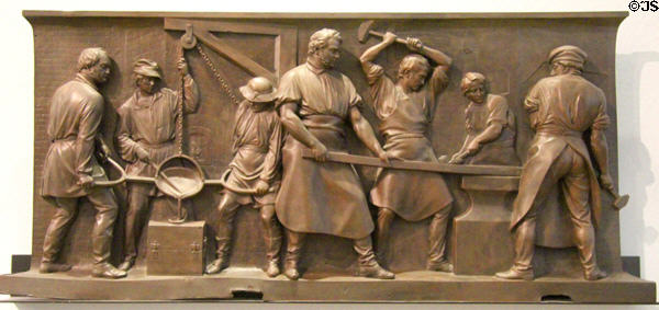 Iron Industry bronze relief sculpture (1861) by Friedrich Drake of Berlin at German Historical Museum. Berlin, Germany.