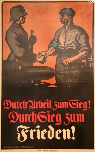 Propaganda poster to mobilize German workers in armament industry (1918) by Alexander M. Cay of Berlin at German Historical Museum. Berlin, Germany.