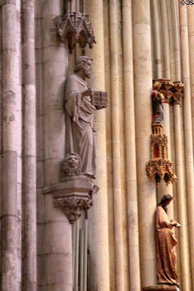 Statue of Evangelist St Mark with his lion symbol at Köln Cathedral. Köln, Germany.