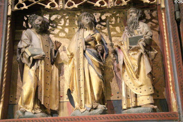 Detail of three Apostles on wing of Mass of St Gregory altarpiece (c1525) at Aachen Cathedral Treasury. Aachen, Germany.