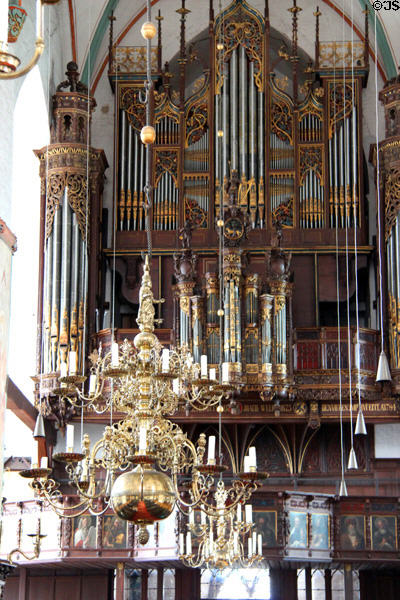 Brass chandelier & organ at St Jacob's Church. Lübeck, Germany.