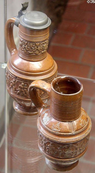 Brown stoneware jugs (16thC) at Schleswig Holstein State Museum. Schleswig, Germany.