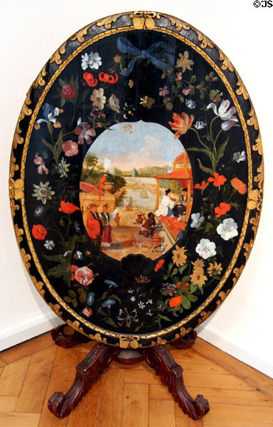 Oval lacquer folding table with oriental scene (c1700) from Holland at Schleswig Holstein State Museum. Schleswig, Germany.