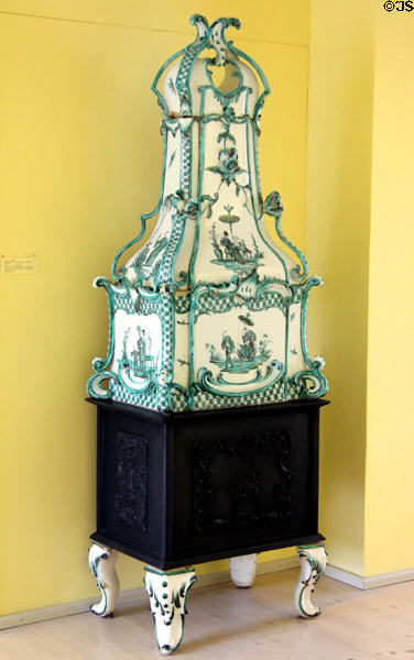 Ceramic room oven with cast iron fire box painted with Rococo chinoiseries based on Chinese models c1780 from Hasselburg Castle at Schleswig Holstein State Museum. Schleswig, Germany.