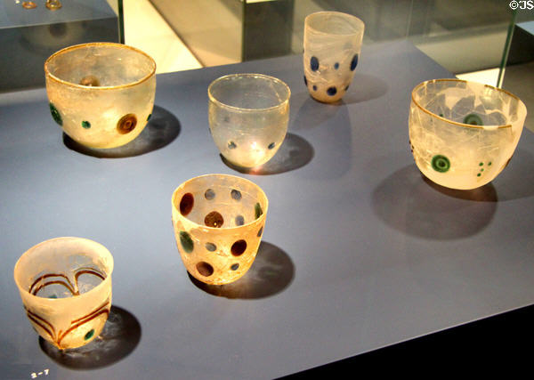 Roman glass beakers with imitation stone inclusions (4thC) at Trier Archaeological Museum. Trier, Germany.