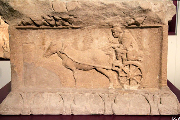 Grave stone carved with horse-drawn chariot on Roman Road (early 3rdC) at Trier Archaeological Museum. Trier, Germany.