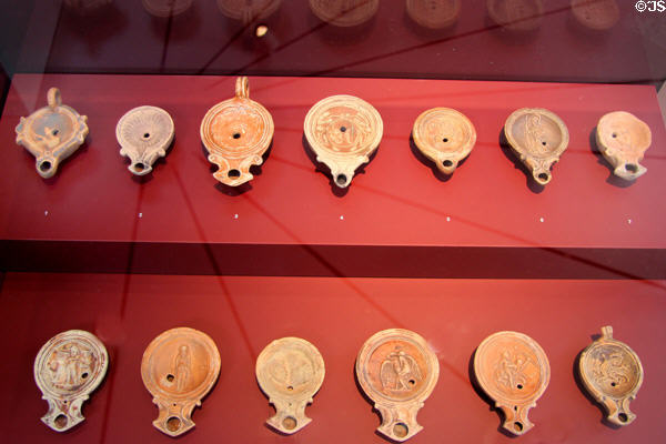 Roman ceramic oil lamps (1stC) at Trier Archaeological Museum. Trier, Germany.