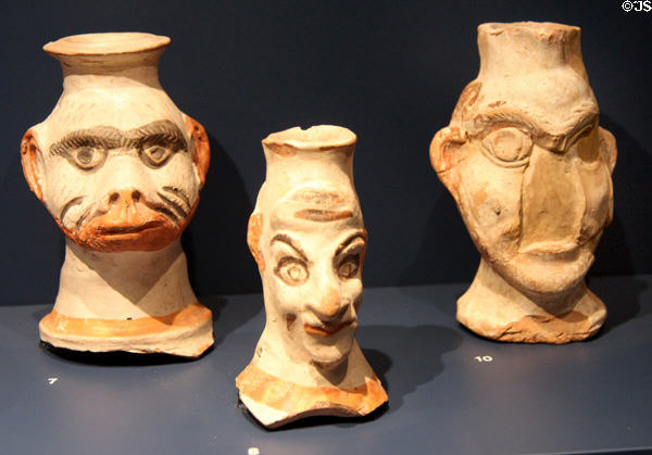 Ceramic vessels in form of grotesque caricature heads (3rdC) at Trier Archaeological Museum. Trier, Germany.