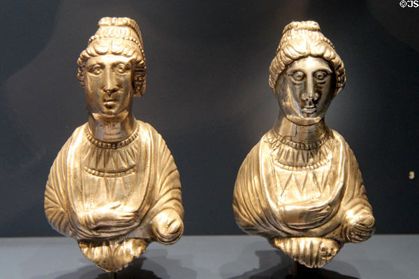 Silver busts of two women (late 4thC) were dated by hairstyle at Trier Archaeological Museum. Trier, Germany.