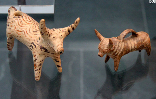 Cyprian terracotta molded pouring vessels in shape of bulls (14th-13thC BCE) from Cyprus at Antikensammlungen. Munich, Germany.