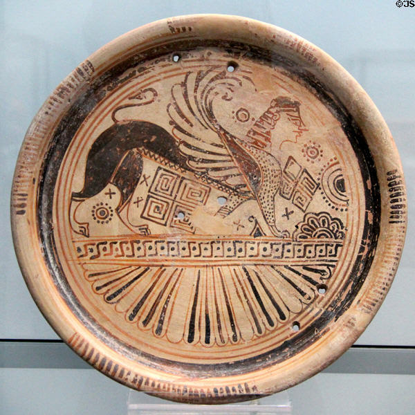 Greek terracotta plate with winged Sphinx (c575-550 BCE) from Eastern Greece at Antikensammlungen. Munich, Germany.