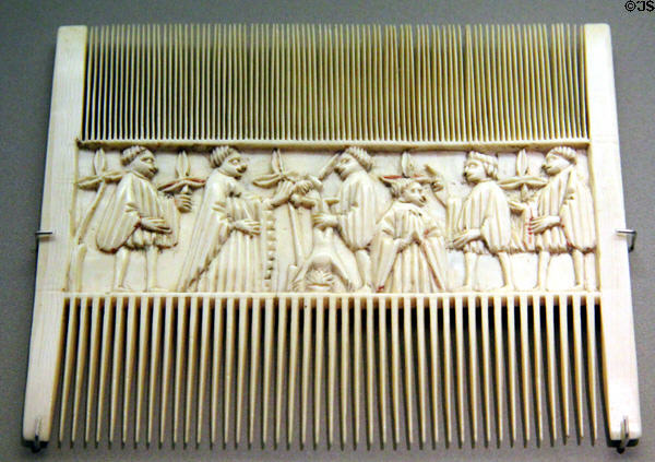 Ivory double comb with carving of wisdom of Salomon (2nd half 14thC) from Italy at Bavarian National Museum. Munich, Germany.