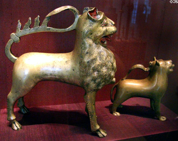 Aquamaniles in form large lion (c1400) from Nuremberg & small lion (early 13thC) made in North Germany at Bavarian National Museum. Munich, Germany.