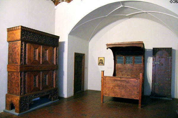 Period room with Bavarian furniture & door (1500s) at Bavarian National Museum. Munich, Germany.