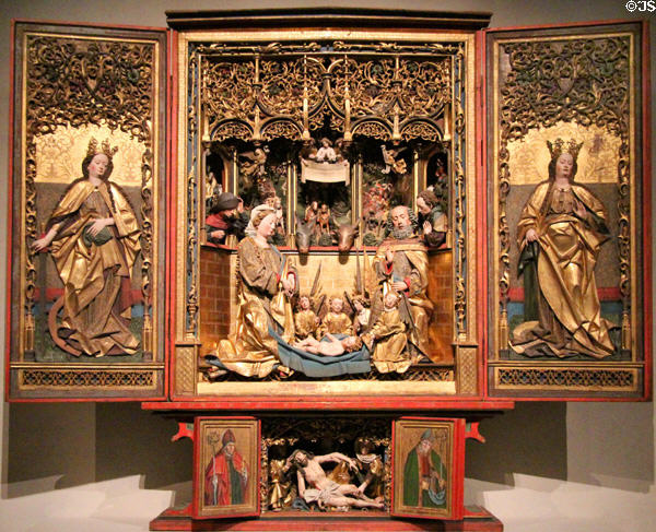 Triptych altar with Nativity scene & saints (c1485-90) by Hans Klocker & workshop from Brixen at Bavarian National Museum. Munich, Germany.