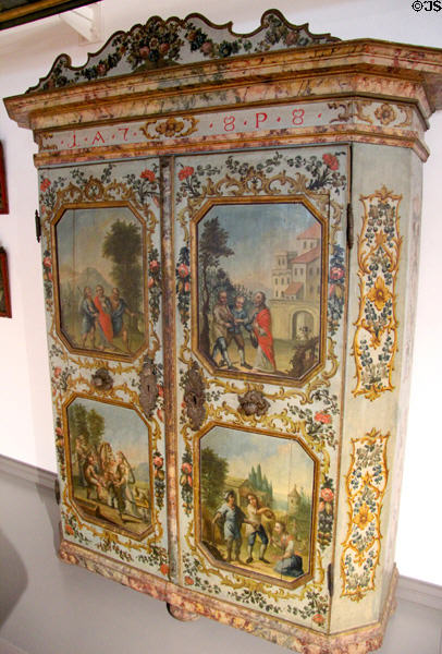 Bavarian wardrobe painted with baroque country scene (1788) at Bavarian National Museum. Munich, Germany.