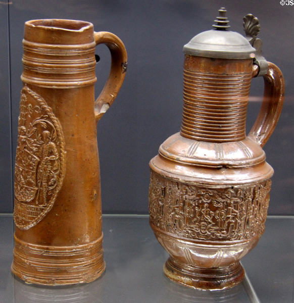 Stoneware tankard (1580) & covered jug with four seasons relief (1589), both from Belgium at Deutsches Museum. Munich, Germany.