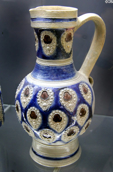 Stoneware jug (2nd half 17thC) with blue & violet colors from Westerwald at Deutsches Museum. Munich, Germany.