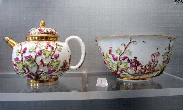 Teapot & bowl with applied relief (c1725) by Johann Gregorius Höroldt at Meissen porcelain museum at Lustheim Palace. Munich, Germany.