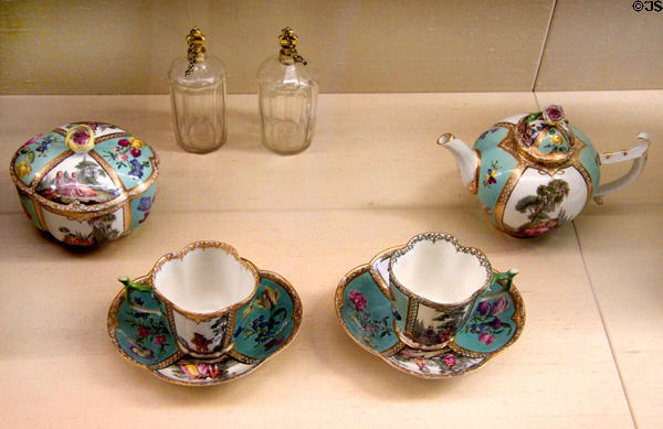 Meissen porcelain tea service over turquoise base painted with German flowers & Watteau scenes (c1755) at Meissen porcelain museum at Lustheim Palace. Munich, Germany.
