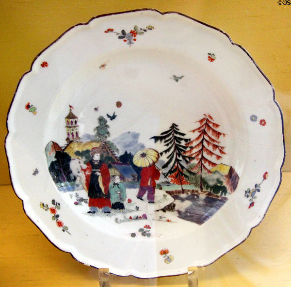 Meissen porcelain plate (c1740) painted with Chinese scene by Adam Friedrich von Löwenfinck at Meissen porcelain museum at Lustheim Palace. Munich, Germany.