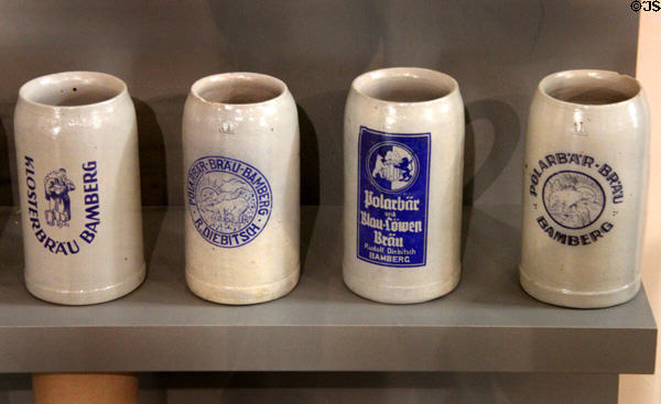 Ceramic beer steins from breweries of Bamberg at Bamberg City Museum. Bamberg, Germany.