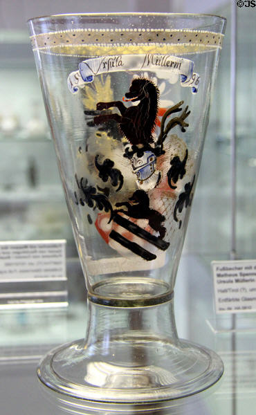 Footed glass beaker with family shields of Matheus Spennesperger & Ursula Müllerin (c1570-80) from Hall/Tirol? at Coburg Castle. Coburg, Germany.