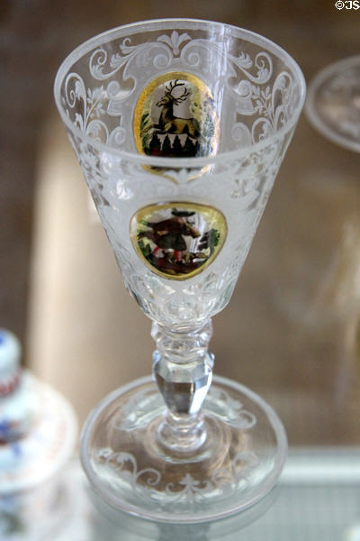 Engraved clear glass goblet lacquer painted with hunter & deer (mid 19thC) from Bohemia at Coburg Castle. Coburg, Germany.