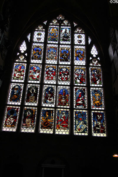 Stained glass window with heraldic shields at St Lawrence Church. Nuremberg, Germany.