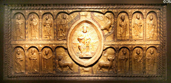 Antependium altar frontal carved relief embossed with copper showing Christ surrounded by Evangelist symbols & twelve apostles (c1220-30) from Schleswig or Jutland at Germanisches Nationalmuseum. Nuremberg, Germany.