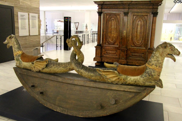 Two seat seesaw carved as dolphins with saddles (mid 18thC) from northern Italy of mid Germany at Germanisches Nationalmuseum. Nuremberg, Germany.