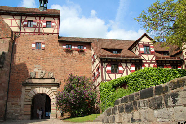 Crests over archway entrance (1562) to Imperial Castle. Nuremberg, Germany.
