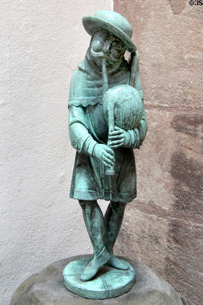 Copy (1888) of Bagpiper fountain statuette (early 16thC) by Friedrich Wanderer at Fembohaus City Museum. Nuremberg, Germany.