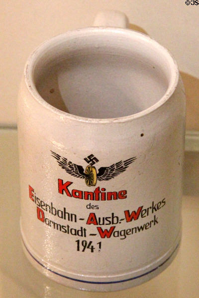 Ceramic mug (1941) with Nazi symbol for railway works canteen at Nuremberg Transport Museum. Nuremberg, Germany.