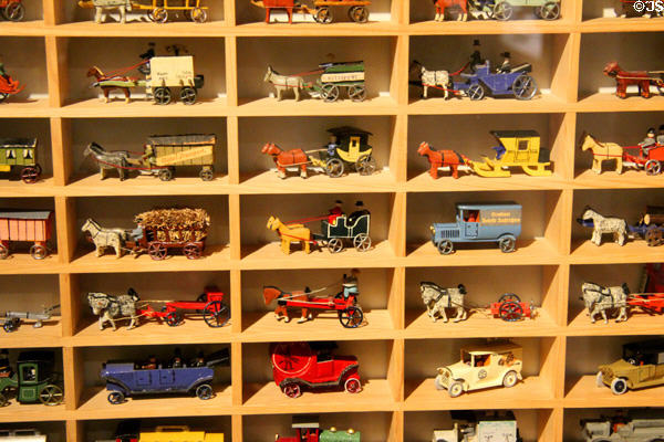 Toy horse-drawn wagons & trucks at City Toy Museum. Nuremberg, Germany.