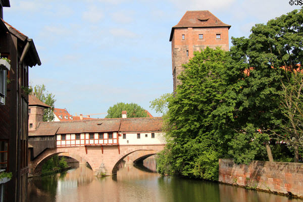 Henker brücke (Hangman's bridge) across Pegnitz River with Water Tower. Nuremberg, Germany.