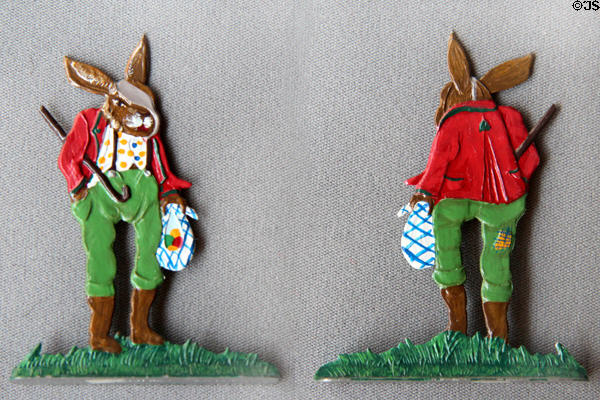 Flat tin elderly rabbit figure (combined front & back views) on cast stand from Germany in private collection. Germany.