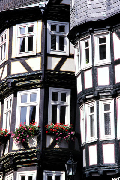 Curving facades & roof lines on older houses on marketplace. Marburg, Germany.