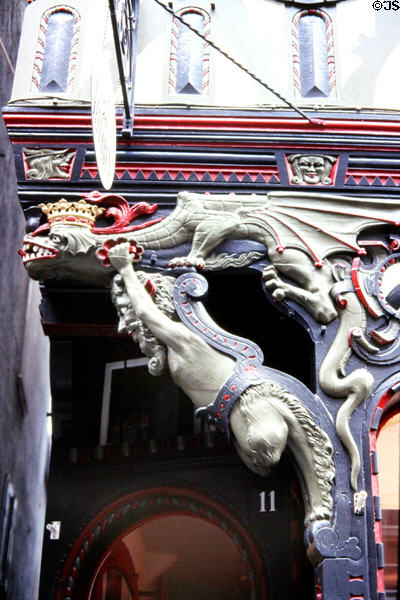 Crowned dragon carving on pharmacy on Wettergasse. Marburg, Germany.