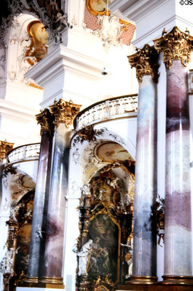 Pillars with gilded ornate pillar caps in Zwiefalten Abbey church. Zwiefalten, Germany.