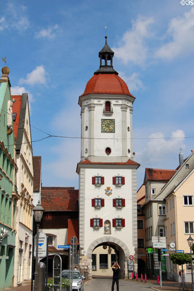 Middle city gate (c1230) flanked by traditional architecture. Dillingen, Germany.