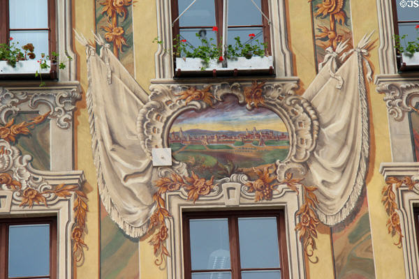 Detail with antique city view on neo-baroque mural (1909) on wall of Steuerhaus (on Marktplatz). Memmingen, Germany.
