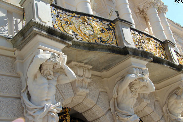 Telamons (male figures) supporting balcony on facade of Linderhof Castle. Ettal, Germany.