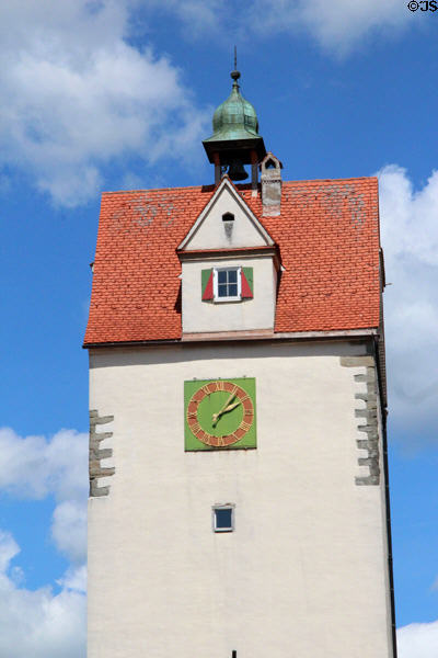 Clock and bell on tower overlooking town. Isny im Allgäu, Germany.