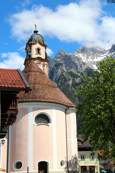 Church of Sts Peter & Paul with Alps foothills in background (1740). Mittenwald, Germany. Style: Baroque. Architect: Joseph Schmuzer.