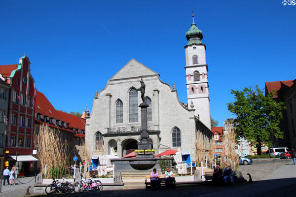St Stephan's Church on Market Square with cast iron statue of Neptune with trident & dolphin (1840). Lindau im Bodensee, Germany.