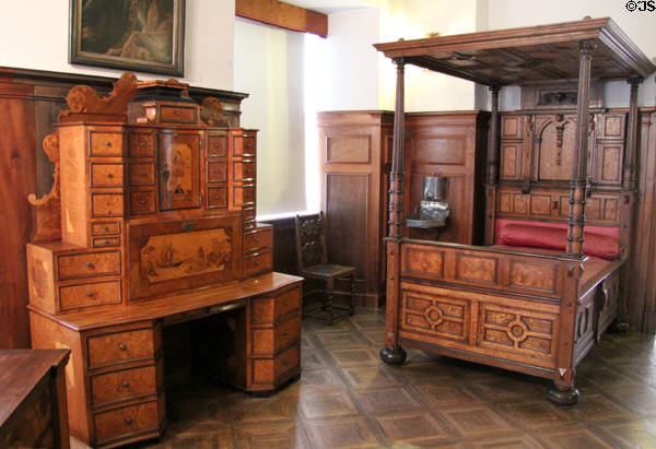 German inlaid furniture (17thC) gallery with writing desk & four-poster bed at Lindau Municipal Museum. Lindau im Bodensee, Germany.