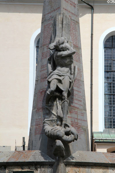 Archangel Michael slaying dragon on memorial to fallen soldiers at St Peter & Paul church. Oberammergau, Germany.